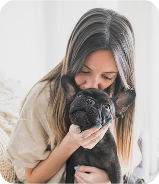 Girl kissing Dog