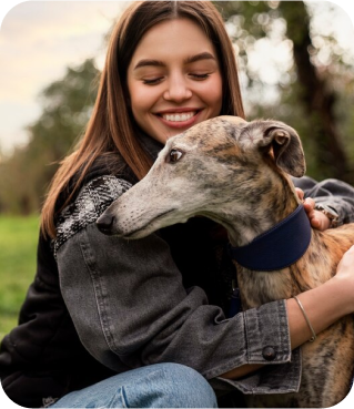 Girl Holding Dog